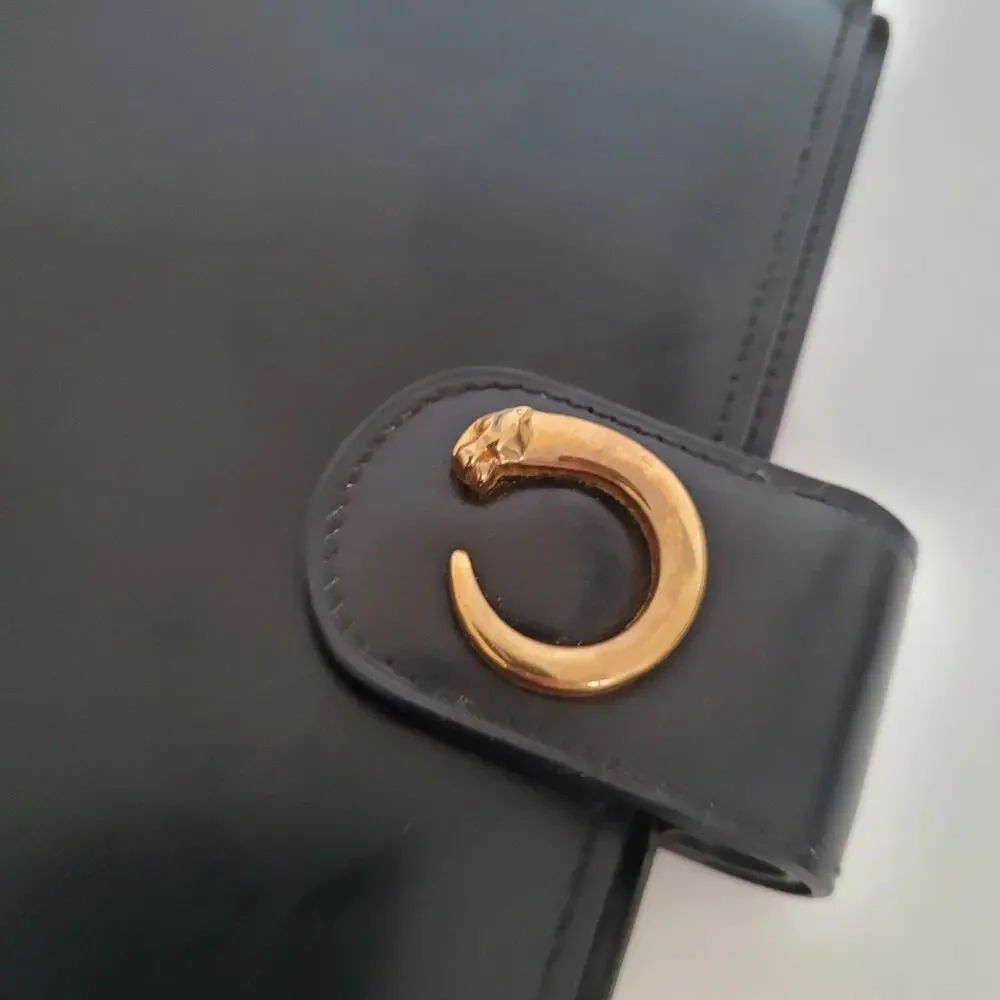 Cartier Black Leather Planner with Gold Panther Accent